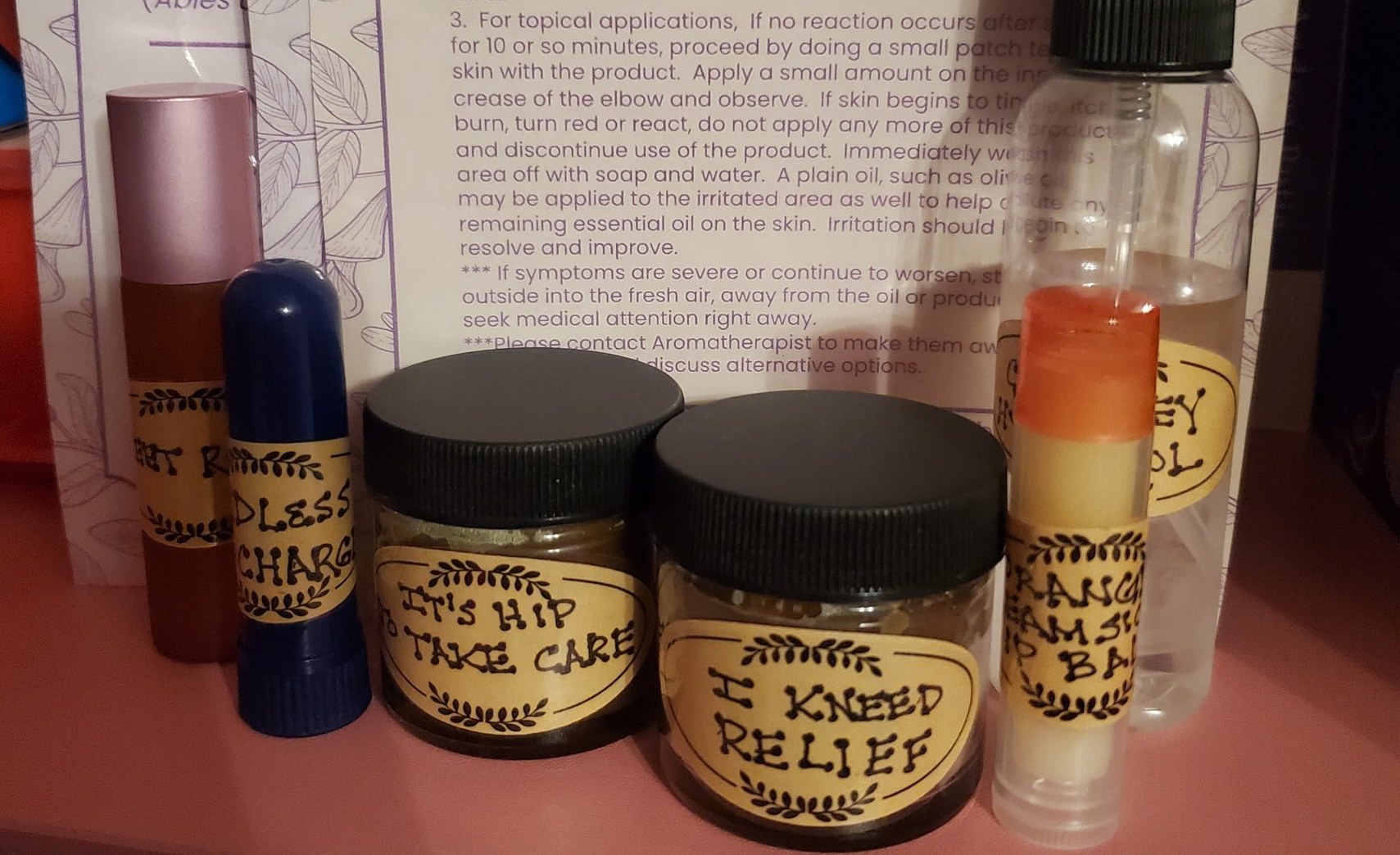 Aromatherapy jars and rollers with hand-lettered labels