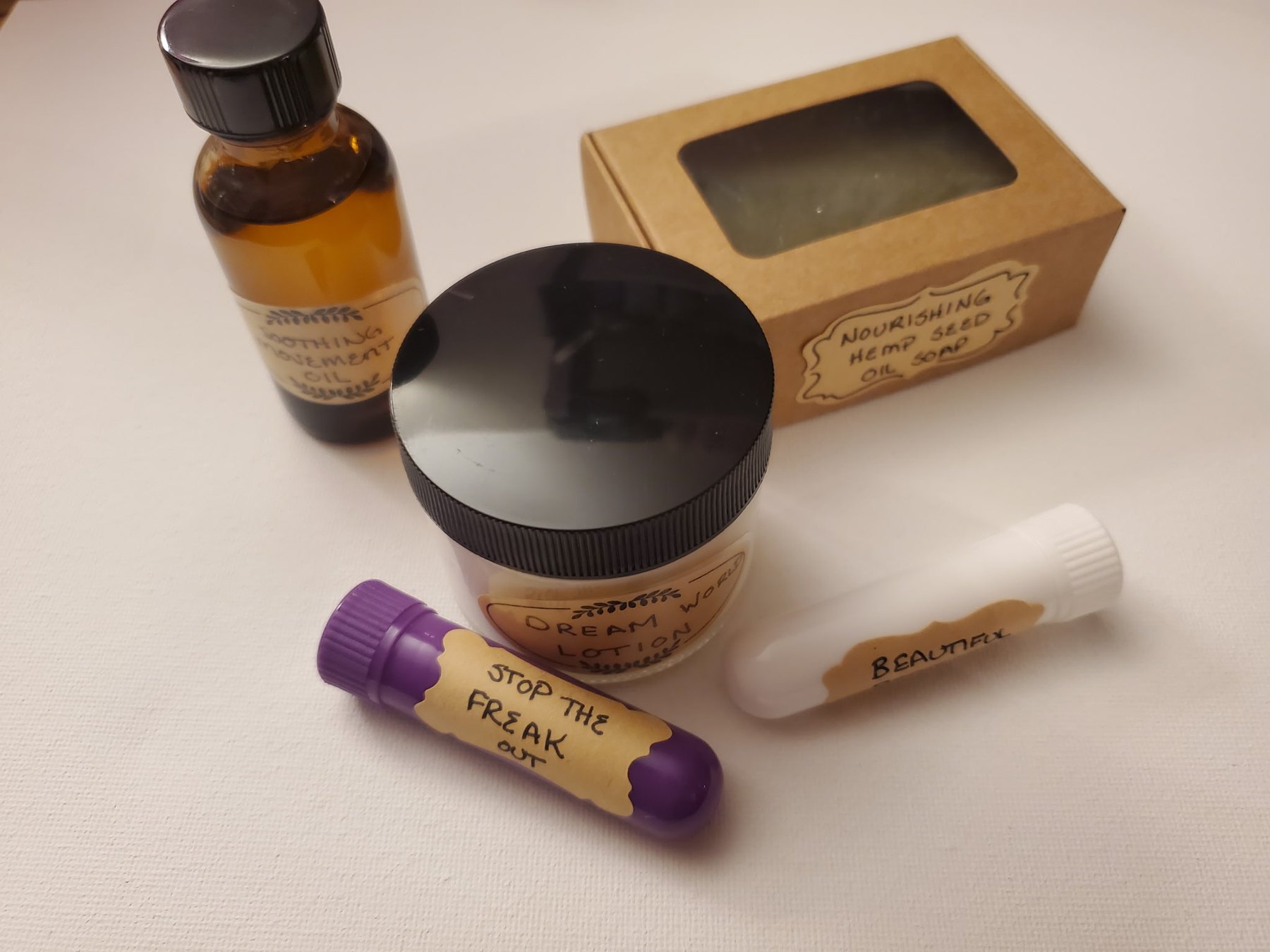 Soothing Movement Oil, Dream World Lotion, hemp seed soap and an inhaler
